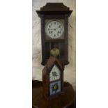 An American Wanut Cased Mantel Clock, 37cm high, also with a wall clock, (2)