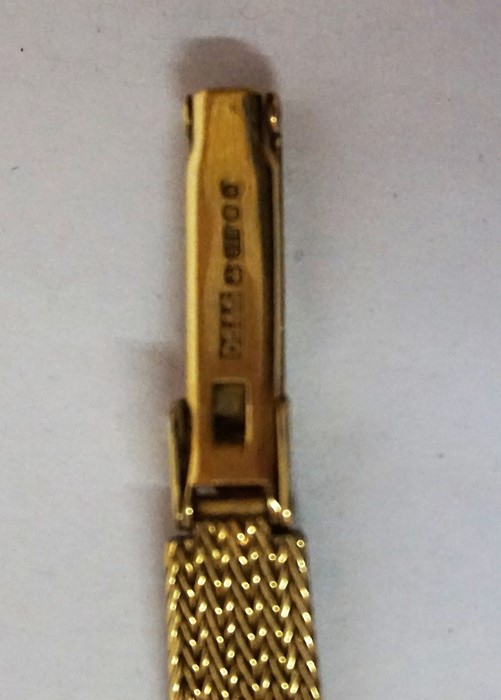 A 9ct Gold Ladies Swiss Made Wristwatch by Marvin, With baton numerals to the dial, on a gold mesh - Image 3 of 3