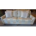 A Large Duresta Two Seater Sofa, In striped upholstery, raised on wooden feet with metal mounts