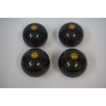 A Set of Four Vintage Bowling Balls, Having ivory mounts, stamped E.W.S, numbered 1 to 4, (4)