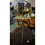 A Brass Revolving Magazine Rack, 77cm high, also with a pub style table, (2)