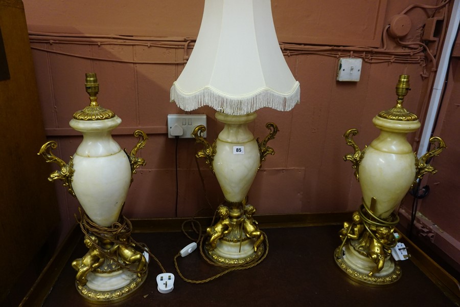 A Garniture of Three French Alabaster and Ormolu Style Urns, circa early 20th century, Converted