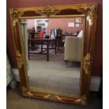 A Contemporary Gilt Framed Wall Mirror, 89cm high, 67cm wide