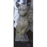 A Stone Garden Figure of a Cat, 50cm high, also with a garden figure of a drunk and a painted garden