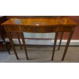 A Mahogany Serpentine Console Table, 20th century, Retailed by Jenners of Edinburgh, with a single
