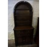 An Oak Dresser by Old Charm, Having open shelving above drawers and panelled doors, 181cm high, 81cm