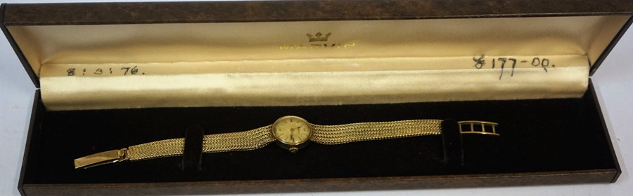 A 9ct Gold Ladies Swiss Made Wristwatch by Marvin, With baton numerals to the dial, on a gold mesh - Image 2 of 3