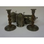A Pair of Arts & Crafts Roundhead Pewter and Oak Candlesticks, 20cm high, also with a hammered