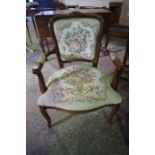 A French Style Elbow Chair, 20th century, Upholstered in floral fabric, 88cm high