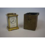 A Brass Carriage Clock, Retailed by Northern Goldsmiths Co, Newcastle upon Tyne, 12cm high, with