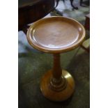 A Victorian Mahogany Alms Stand, Having a centre turned column, raised on a circular base, 73cm