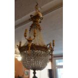 A French Cut Glass Chandelier, circa 19th century, Having three gilt metal two branch candle