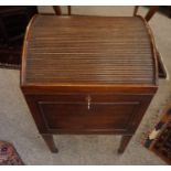 A George III Style Mahogany Wine Cooler, circa 19th century, Having a hinged tambour shutter top,