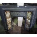 A Victorian Style Cast Iron Fire Insert, Inset with tiles, 96cm high, 102cm wide