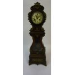 A French Model of a Longcase Clock, circa late 19th century, The enamel dial signed St Denis
