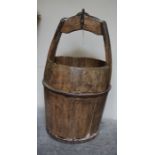 A Wooden and Iron Well Bucket, circa 19th century, 68cm high