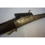 An Indian Matchlock Gun, circa 19th century, Having a walnut butt and stock, with ramrod, 182cm