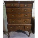 A Queen Anne Walnut Chest on Chest, circa 1710, Having two small drawers above three long