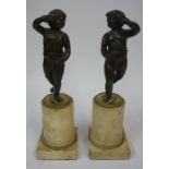 A Pair of French Bronze Figures, circa 19th century, Modelled as young males, raised on a