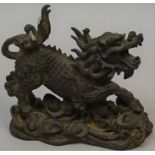 A Chinese Bronze Figure of a Dog of Foe, circa 19th century, 13cm high