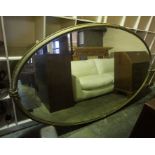 A Victorian Gilt Framed Wall Mirror, Of oval form, 244cm high, 140cm wide