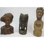 Three African Carved Hardwood Busts, One example is Sudanese, 30cm, 40cm high, (3)