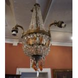 A French Crystal Chandelier, Having three gilt metal branches, Decorated with crystal and tinted