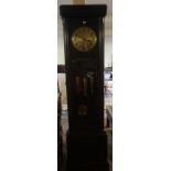 An Oak Cased Three Train Longcase Clock, circa 1910, Having a glazed door enclosing three weights