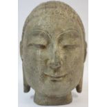 A 17th Century Style Oriental Stone Bust, Modelled as a Buddha, 30cm high