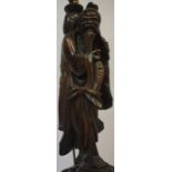 An Oriental Rootwood Figure of a Fisherman, circa late 19th century, converted to a table lamp, 47cm