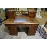 A Victorian Mahogany Dickens Desk, Having a superstructure with four drawers to each side, above a