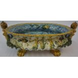 A Continental Majolica Fruit Bowl, circa 19th century, Decorated with dolphins to the interior,