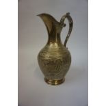 A Silver Claret Jug, Hallmarks for Glasgow 1887, Makers marks initialed J.R, Decorated with panels