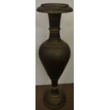 An Indian Brass Baluster Vase, Having foliate decoration, 90cm high