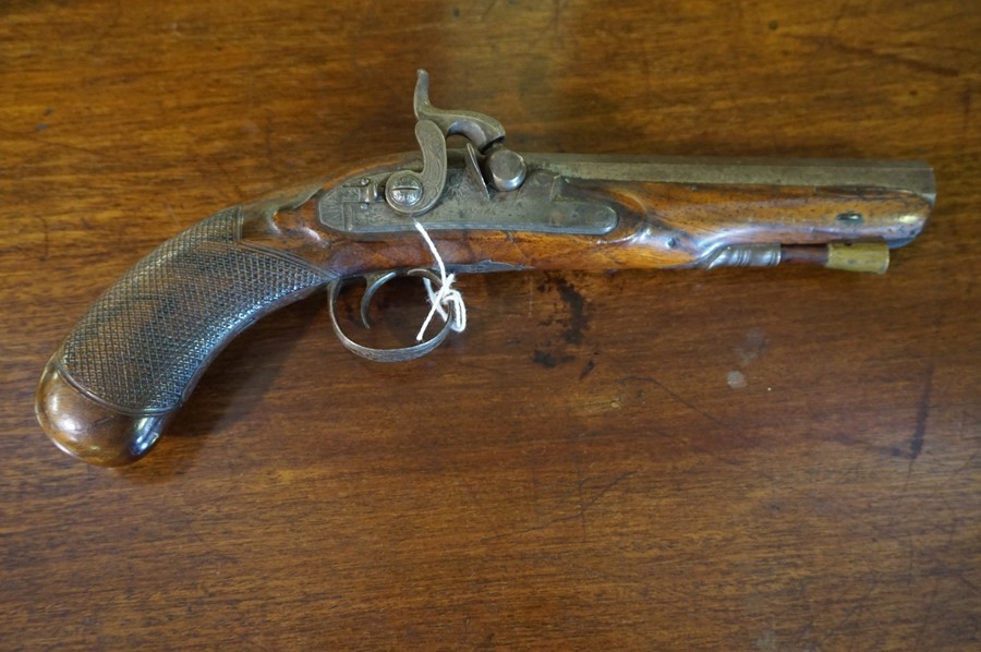 A Percussion Pistol by H.Nock of London, circa early 19th century, Having an octagonal barrel,