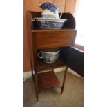 A Mahogany Washstand, circa 19th century, Having a fitted open top above a door, enclosing four