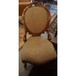 A Victorian Ladies Walnut Parlour Chair, Having a spoon back rest, with a fabric covered stuff