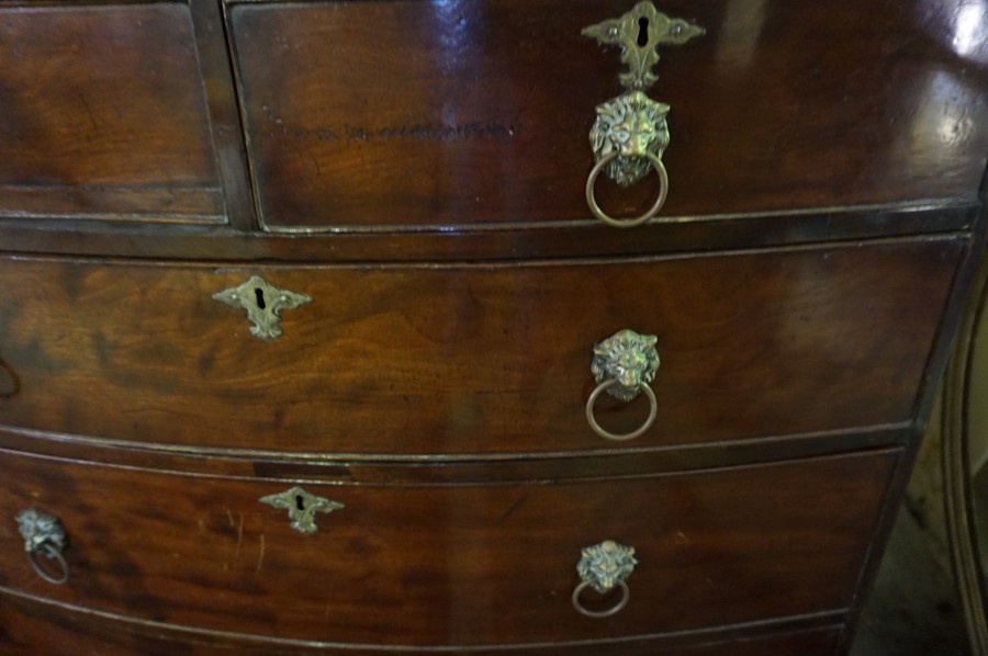 A Georgian Mahogany Bow Front Chest of Drawers, Having two small drawers above three long drawers, - Image 2 of 2