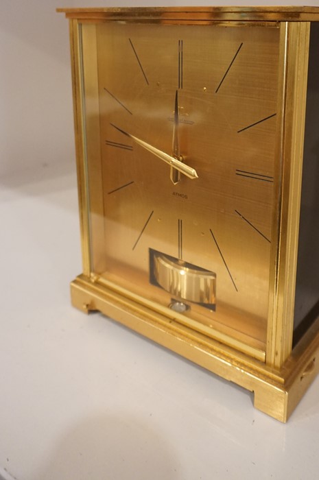 A Jaeger Le Coultre Atmos Clock, Possibly a Marina design, Having a gilded dial with black baton - Image 4 of 7