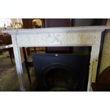 An Adams Style Painted Fire Surround, circa late 18th / early 19th century, Decorated with naval
