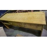 A Victorian Stripped Pine Dresser Base, Having two deep drawers, one drawer lacking, 90cm high,