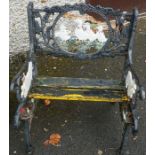 A Childs Cast Iron Garden Seat, Decorated with moulded panels of animals, 51cm high