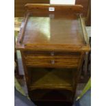 A Mahogany Bedside Cabinet, Having a leather tooled slide, above a drawer and open recess, 80cm