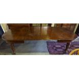 Oak Extending Dining Table, circa early 20th century, Having two additional leaves, raised on