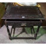 A Jacobean Revival Oak Side Table, Having a single drawer, raised on turned supports with