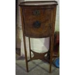 A Pollard Oak Pot Cupboard, circa 19th century, Having a panelled door above under tier, 89cm