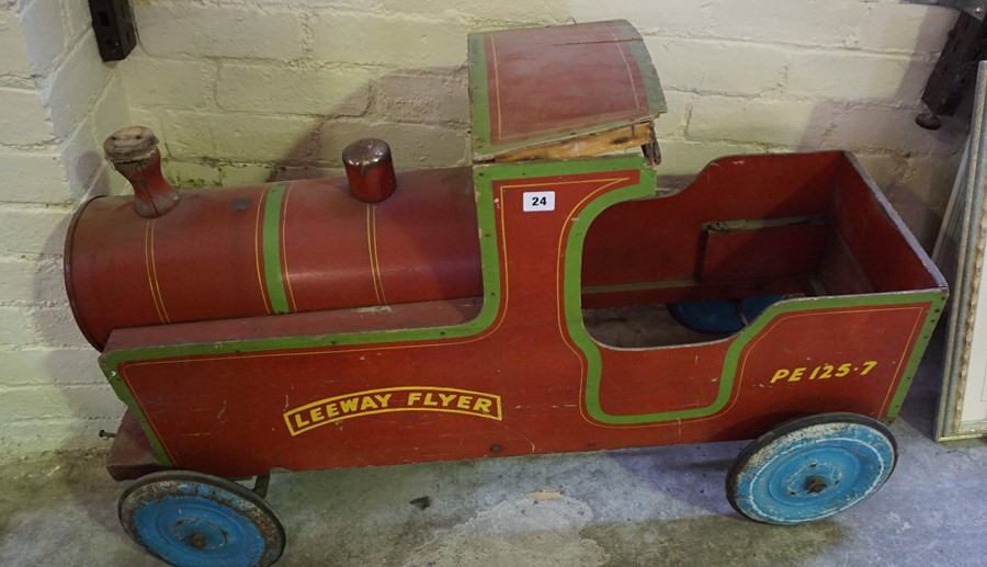 A Model Train "Leeway Flyer", circa 1950s, painted in red, PE 125-7, raised on wheels, 62cm high,