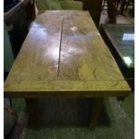 A Fruit Wood Kitchen Table, Having a plank top, raised on square tapered legs, 72cm high, 162cm