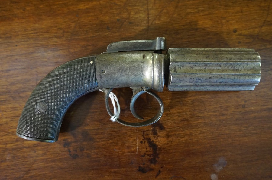 A Six Shot Pepperbox Revolver, circa 19th century, Having an engraved action and butt plate, proof