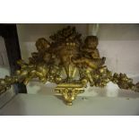 A Continental Gilded Plaster Pediment / Wall Hanging, circa 19th century, Decorated with cupids,